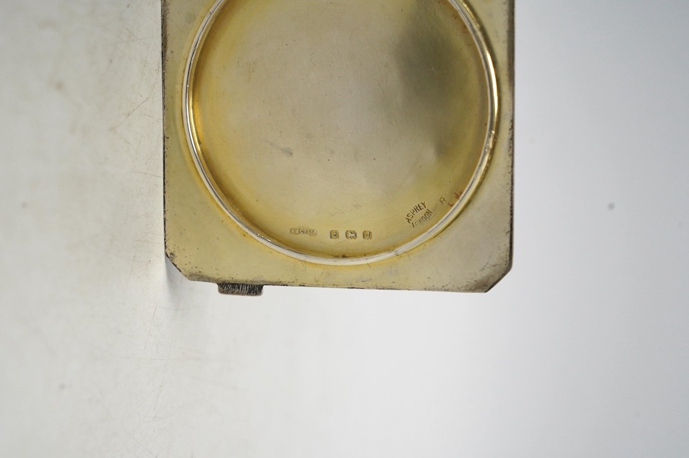A George V silver and blue guilloche enamel compact by Asprey & Co, Birmingham, 1933, 72mm. Condition - poor